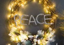 light up christmas wreath with peace across it