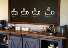 Coffee bar area with rustic barn doors and chalkboard.