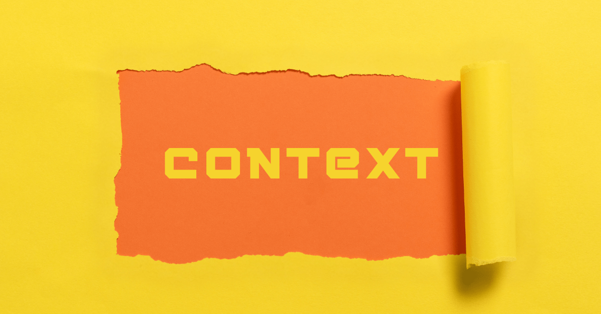 Yellow paint pealing to reveal the word CONTEXT.