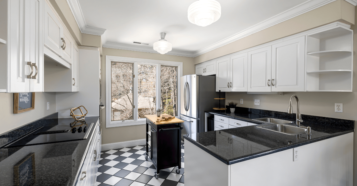 Retro kitchen with black and white checkerboard flooring.