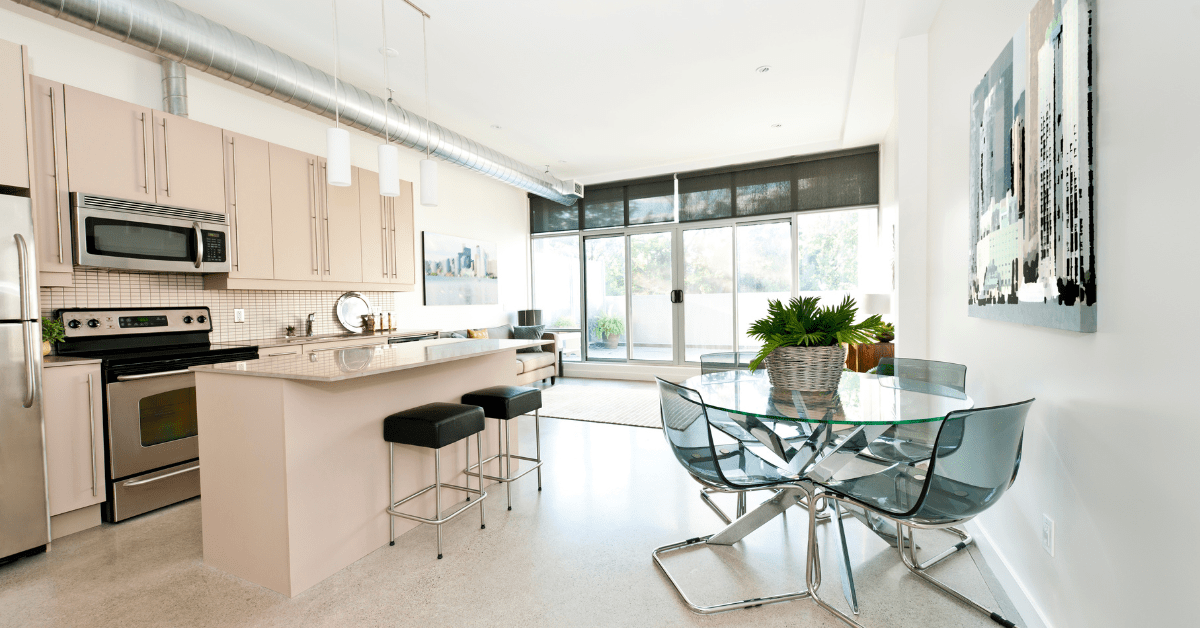 Chic kitchen with bright colors and concrete flooring.