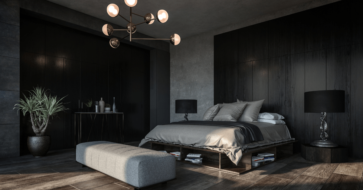 Modern black bedroom with dark furniture.