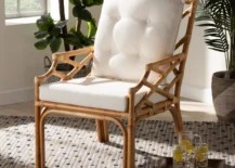 rattan arm chair with white cushion