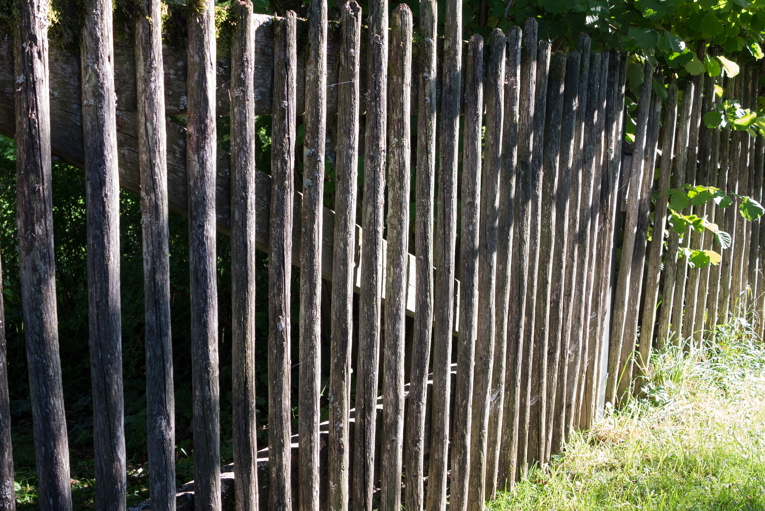 Picket fence made from salvaged wood.